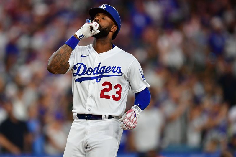 Jul 24, 2023; Los Angeles, California, USA; Los Angeles Dodgers right fielder Jason Heyward (23) reacts after hitting a solo home run against the Toronto Blue Jays during the fourth inning at Dodger Stadium. Mandatory Credit: Gary A. Vasquez-USA TODAY Sports