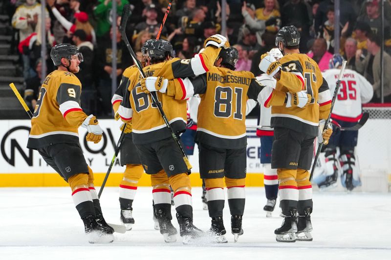 Dec 2, 2023; Las Vegas, Nevada, USA; Vegas Golden Knights right wing Jonathan Marchessault (81) celebrates with team mates after scoring a goal against the Washington Capitals during the first period at T-Mobile Arena. Mandatory Credit: Stephen R. Sylvanie-USA TODAY Sports