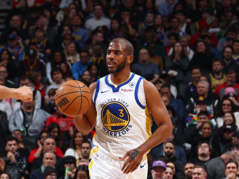 TORONTO, CANADA - MARCH 1:  Chris Paul #3 of the Golden State Warriors handles the ball during the game  on March 1, 2024 at the Scotiabank Arena in Toronto, Ontario, Canada.  NOTE TO USER: User expressly acknowledges and agrees that, by downloading and or using this Photograph, user is consenting to the terms and conditions of the Getty Images License Agreement.  Mandatory Copyright Notice: Copyright 2024 NBAE (Photo by Vaughn Ridley/NBAE via Getty Images)