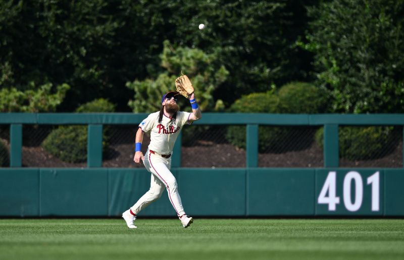 Aug 28, 2024; Philadelphia, Pennsylvania, USA; Philadelphia Phillies outfielder Brandon Marsh (16) fields a fly ball against the Houston Astros in the first inning at Citizens Bank Park. Mandatory Credit: Kyle Ross-USA TODAY Sports