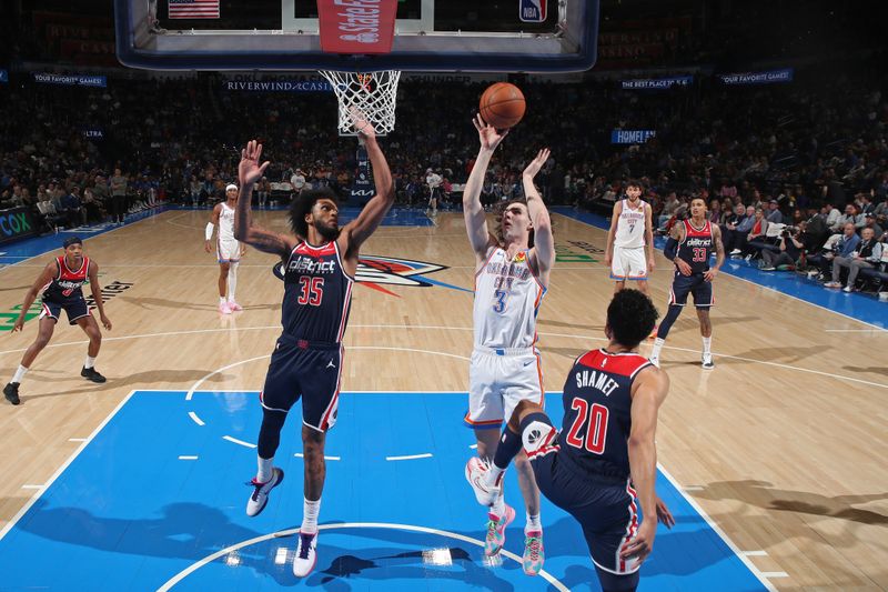 OKLAHOMA CITY, OK - FEBRUARY 23: Josh Giddey #3 of the Oklahoma City Thunder drives to the basket during the game against the Washington Wizards on February 23, 2024 at Paycom Arena in Oklahoma City, Oklahoma. NOTE TO USER: User expressly acknowledges and agrees that, by downloading and or using this photograph, User is consenting to the terms and conditions of the Getty Images License Agreement. Mandatory Copyright Notice: Copyright 2024 NBAE (Photo by Zach Beeker/NBAE via Getty Images)