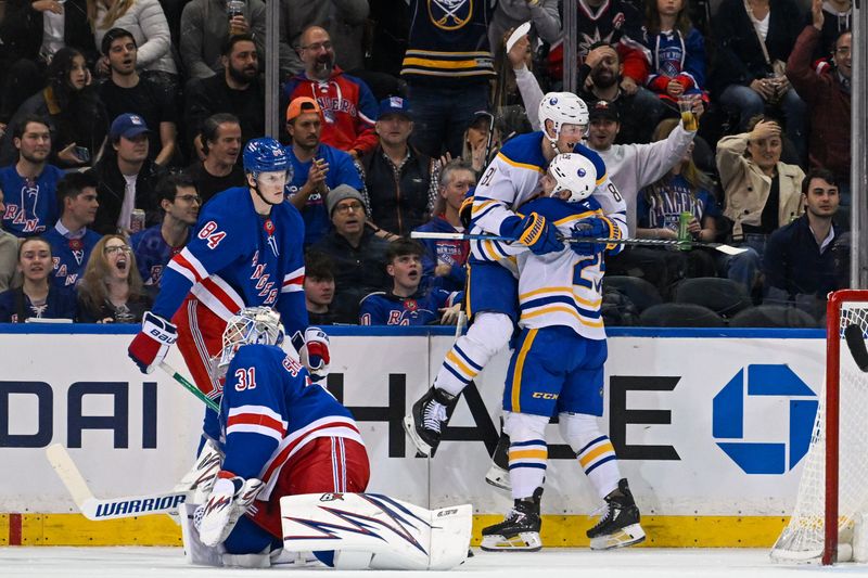 Nov 7, 2024; New York, New York, USA;  Buffalo Sabres center Sam Lafferty (81) celebrates his goal with left wing Beck Malenstyn (29) against the New York Rangers during the second period at Madison Square Garden. Mandatory Credit: Dennis Schneidler-Imagn Images