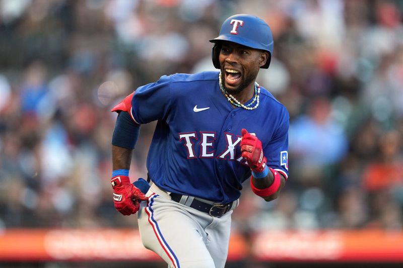 Aug 12, 2023; San Francisco, California, USA; Texas Rangers left fielder J.P. Martinez (50) reacts after hitting a single for his first MLB hit during the fourth inning against the San Francisco Giants at Oracle Park. Mandatory Credit: Darren Yamashita-USA TODAY Sports