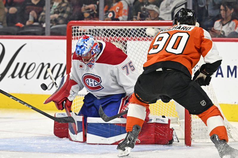 Apr 14, 2026; Philadelphia, Pennsylvania, USA; Montréal Canadiens goaltender Jakub Dobes (75) makes a save against Philadelphia Flyers center Anthony Richard (90) during the second period at Xfinity Mobile Arena. Mandatory Credit: Eric Hartline-Imagn Images Apr 14, 2026; Philadelphia, Pennsylvania, USA; Montréal Canadiens goaltender Jakub Dobes (75) makes a save against Philadelphia Flyers center Anthony Richard (90) during the second period at Xfinity Mobile Arena. Mandatory Credit: Eric Hartline-Imagn Images