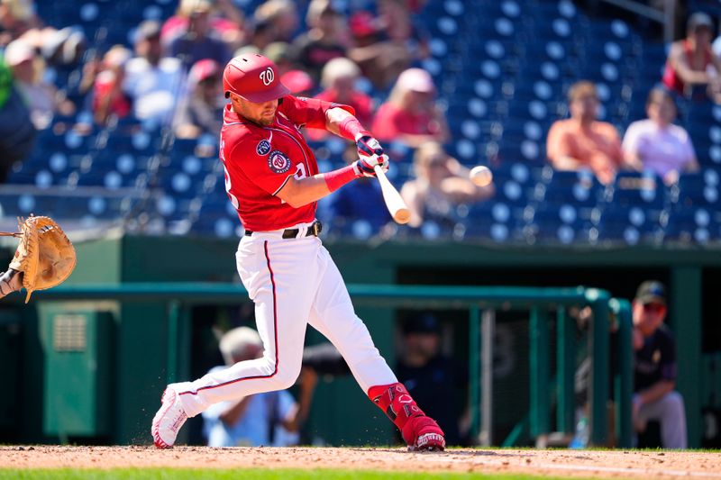 Sep 3, 2023; Washington, District of Columbia, USA;  Washington Nationals right fielder Lane Thomas (28) hits a RBI single against the Miami Marlins  during the fifth inning at Nationals Park. Mandatory Credit: Gregory Fisher-USA TODAY Sports