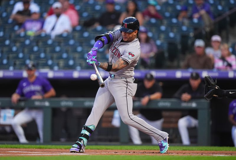 Sep 16, 2024; Denver, Colorado, USA; Arizona Diamondbacks second base Ketel Marte (4) celebrates hits a two run home run in the first inning against the Colorado Rockies at Coors Field. Mandatory Credit: Ron Chenoy-Imagn Images