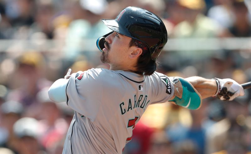 Aug 4, 2024; Pittsburgh, Pennsylvania, USA;  Arizona Diamondbacks right fielder Corbin Carroll (7) hits a triple against the Pittsburgh Pirates during the sixth inning at PNC Park. Mandatory Credit: Charles LeClaire-USA TODAY Sports