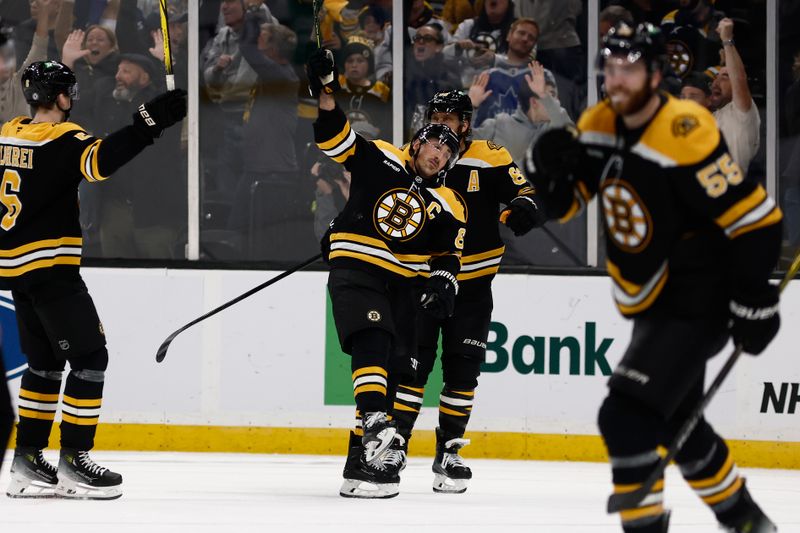 Oct 26, 2024; Boston, Massachusetts, USA; Boston Bruins left wing Brad Marchand (63) ccelebrates their overtime win against the Toronto Maple Leafs at TD Garden. Mandatory Credit: Winslow Townson-Imagn Images