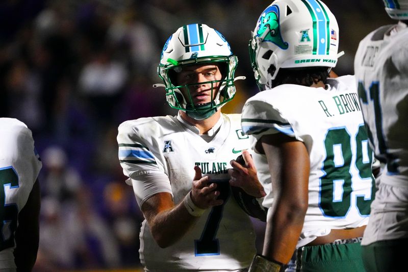 Nov 4, 2023; Greenville, North Carolina, USA;  Tulane Green Wave quarterback Michael Pratt (7) and tight end Reggie Brown (89) celebrate their victory against the East Carolina Pirates at Dowdy-Ficklen Stadium. Mandatory Credit: James Guillory-USA TODAY Sports