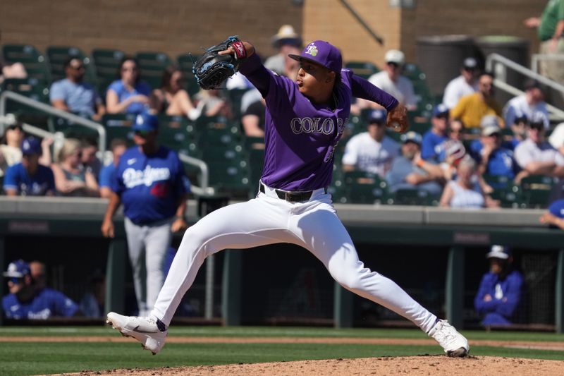 Mar 2, 2026; Salt River Pima-Maricopa, Arizona, USA; Colorado Rockies pitcher Welinton Herrera (59) throws against the Los Angeles Dodgers in the second inning at Salt River Fields at Talking Stick. Mandatory Credit: Rick Scuteri-Imagn Images