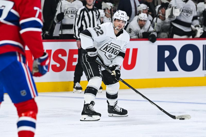 Nov 11, 2025; Montreal, Quebec, CAN; Los Angeles Kings left wing Kevin Fiala (22) controls the puck against the Montreal Canadiens during the second period at Bell Centre. Mandatory Credit: David Kirouac-Imagn Images