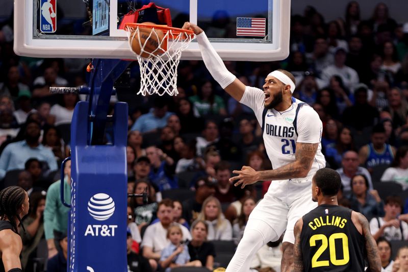 DALLAS, TEXAS - OCTOBER 10: Daniel Gafford #21 of the Dallas Mavericks dunks the ball against John Collins #20 of the Utah Jazz in the second half at American Airlines Center on October 10, 2024 in Dallas, Texas. NOTE TO USER: User expressly acknowledges and agrees that, by downloading and or using this Photograph, user is consenting to the terms and conditions of the Getty Images License Agreement. Mandatory Copyright Notice: Copyright 2024 NBAE  (Photo by Tim Heitman/Getty Images)