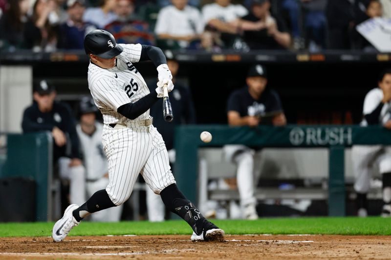 Sep 24, 2024; Chicago, Illinois, USA; Chicago White Sox first baseman Andrew Vaughn (25) singles against the Los Angeles Angels during the seventh inning at Guaranteed Rate Field. Mandatory Credit: Kamil Krzaczynski-Imagn Images