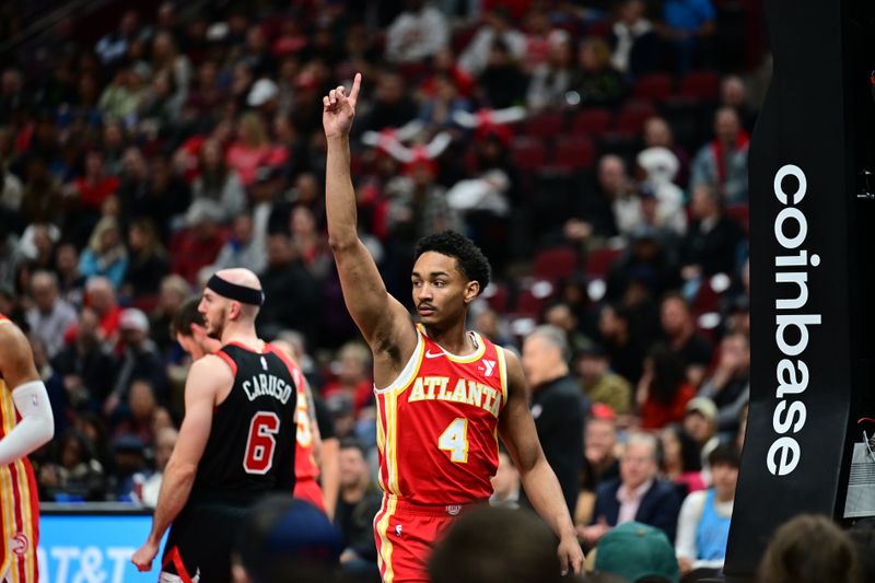 CHICAGO, IL - APRIL 1: Kobe Bufkin #4 of the Atlanta Hawks celebrates during the game against the Chicago Bulls on April 1, 2024 at United Center in Chicago, Illinois. NOTE TO USER: User expressly acknowledges and agrees that, by downloading and or using this photograph, User is consenting to the terms and conditions of the Getty Images License Agreement. Mandatory Copyright Notice: Copyright 2024 NBAE (Photo by Adam Hagy/NBAE via Getty Images)