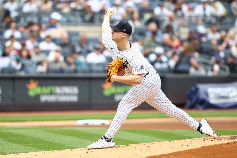 May 4, 2024; Bronx, New York, USA;  New York Yankees starting pitcher Clarke Schmidt (36) pitches in the first inning against the Detroit Tigers at Yankee Stadium. Mandatory Credit: Wendell Cruz-USA TODAY Sports