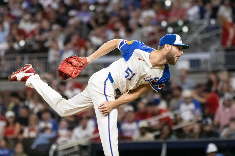 Sep 14, 2024; Cumberland, Georgia, USA; Atlanta Braves pitcher Chris Sale (51) pitches the ball against Los Angeles Dodgers during the fourth inning at Truist Park. Mandatory Credit: Jordan Godfree-Imagn Images