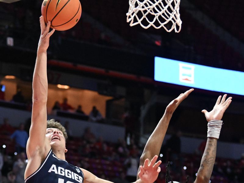 Jan 13, 2024; Las Vegas, Nevada, USA; Las Vegas Aces guard Chelsea Gray (12) scores on UNLV Rebels forward Keylan Boone (20) in the second half at Thomas & Mack Center. Mandatory Credit: Candice Ward-USA TODAY Sports