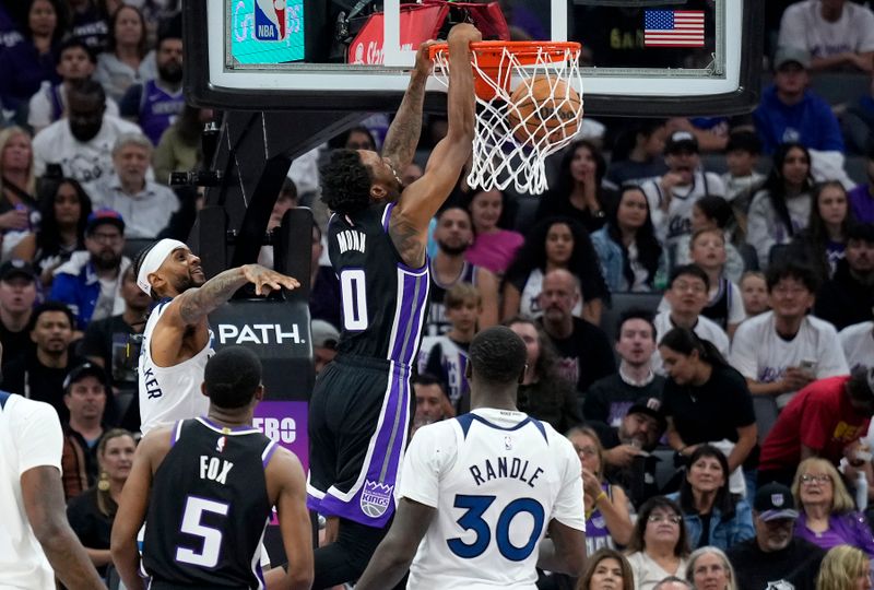 SACRAMENTO, CALIFORNIA - OCTOBER 24: Malik Monk #0 of the Sacramento Kings slam dunks against the Minnesota Timberwolves in the first quarter at Golden 1 Center on October 24, 2024 in Sacramento, California. NOTE TO USER: User expressly acknowledges and agrees that, by downloading and or using this photograph, User is consenting to the terms and conditions of the Getty Images License Agreement. (Photo by Thearon W. Henderson/Getty Images)