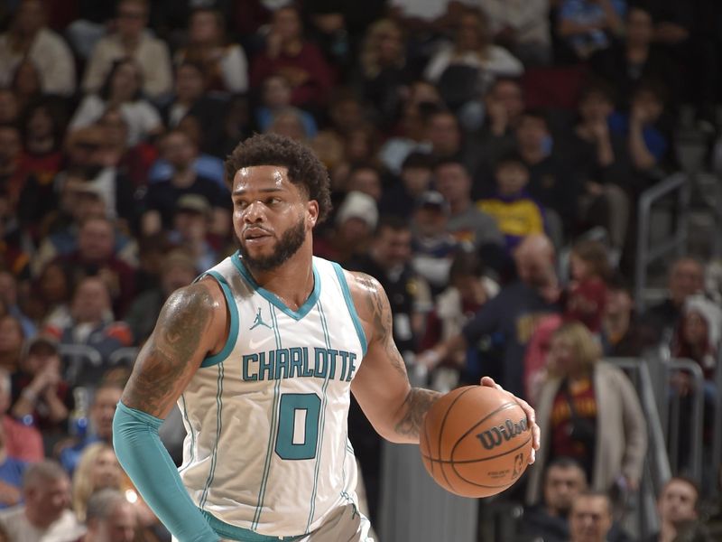 CLEVELAND, OH - JANUARY 5: Miles Bridges #0 of the Charlotte Hornets handles the ball during the game against the Cleveland Cavaliers on January 5, 2025 at Rocket Mortgage FieldHouse in Cleveland, Ohio. NOTE TO USER: User expressly acknowledges and agrees that, by downloading and/or using this Photograph, user is consenting to the terms and conditions of the Getty Images License Agreement. Mandatory Copyright Notice: Copyright 2025 NBAE (Photo by David Liam Kyle/NBAE via Getty Images)