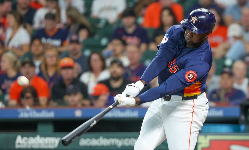 May 15, 2024; Houston, Texas, USA; Houston Astros designated hitter Yordan Alvarez (44) bats against the Oakland Athletics in the first inning at Minute Maid Park. Mandatory Credit: Thomas Shea-USA TODAY Sports