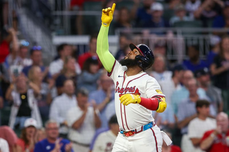 May 28, 2024; Atlanta, Georgia, USA; Atlanta Braves designated hitter Marcell Ozuna (20) celebrates after a home run against the Washington Nationals in the seventh inning at Truist Park. Mandatory Credit: Brett Davis-USA TODAY Sports