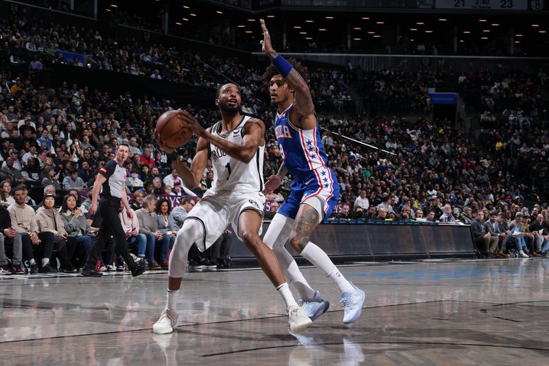 BROOKLYN, NY - MARCH 5: Mikal Bridges #1 of the Brooklyn Nets drives to the basket during the game against the Philadelphia 76ers on March 5, 2024 at Barclays Center in Brooklyn, New York. NOTE TO USER: User expressly acknowledges and agrees that, by downloading and or using this Photograph, user is consenting to the terms and conditions of the Getty Images License Agreement. Mandatory Copyright Notice: Copyright 2024 NBAE (Photo by Jesse D. Garrabrant/NBAE via Getty Images)