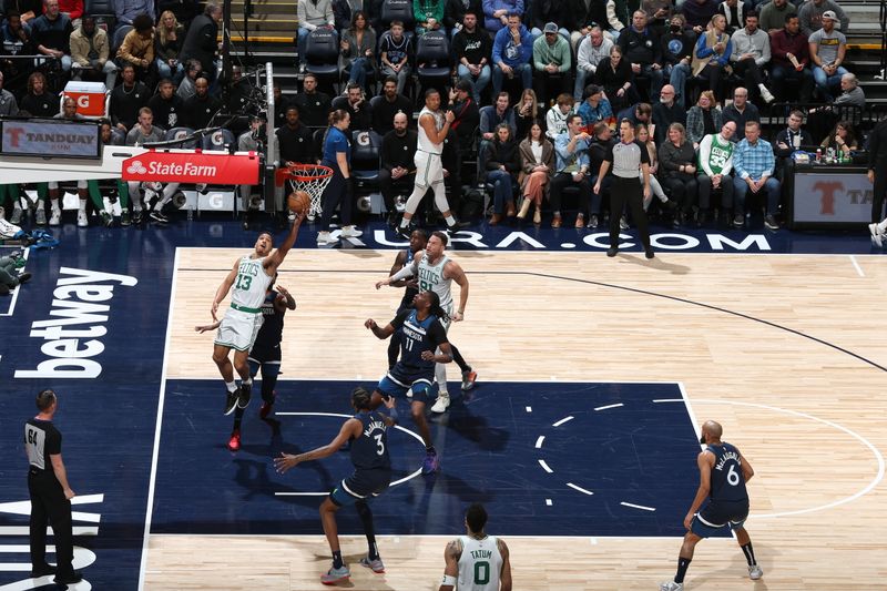 MINNEAPOLIS, MN -  MARCH 15: Malcolm Brogdon #13 of the Boston Celtics goes to the basket during the game on March 15, 2023 at Target Center in Minneapolis, Minnesota. NOTE TO USER: User expressly acknowledges and agrees that, by downloading and or using this Photograph, user is consenting to the terms and conditions of the Getty Images License Agreement. Mandatory Copyright Notice: Copyright 2023 NBAE (Photo by David Sherman/NBAE via Getty Images)