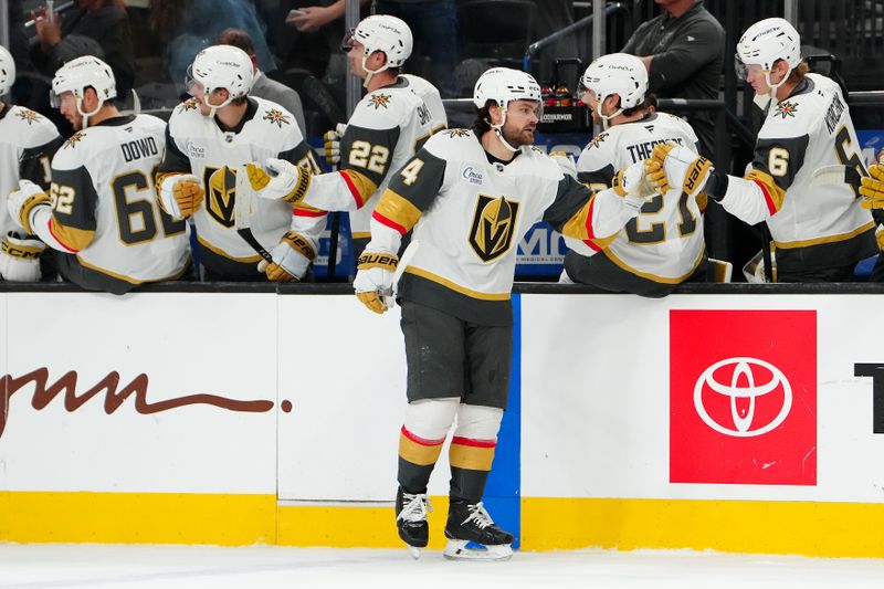 Mar 14, 2026; Las Vegas, Nevada, USA; Vegas Golden Knights defenseman Rasmus Andersson (4) celebrates after scoring a goal against the Chicago Blackhawks during the first period at T-Mobile Arena. Mandatory Credit: Stephen R. Sylvanie-Imagn Images