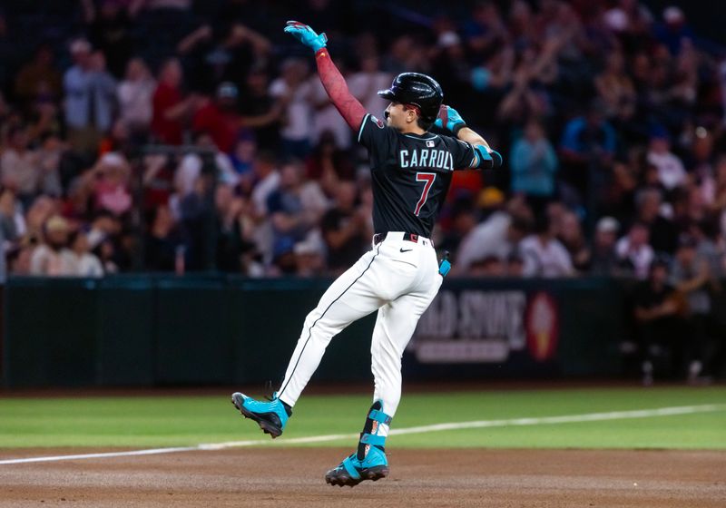 May 5, 2025; Phoenix, Arizona, USA; Arizona Diamondbacks outfielder Corbin Carroll celebrates after hitting a home run in the first inning against the New York Mets at Chase Field. Mandatory Credit: Mark J. Rebilas-Imagn Images