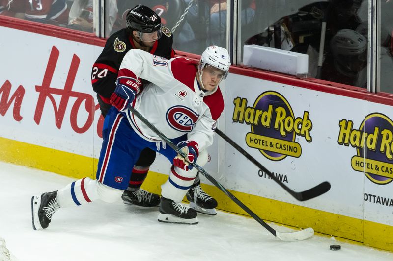 Apr 11, 2025; Ottawa, Ontario, CAN; Ottawa Senators center Dylan Cozens (24) battles with Montreal Canadiens defenseman Kaiden Guhle (21) in the third period at the Canadian Tire Centre. Mandatory Credit: Marc DesRosiers-Imagn Images