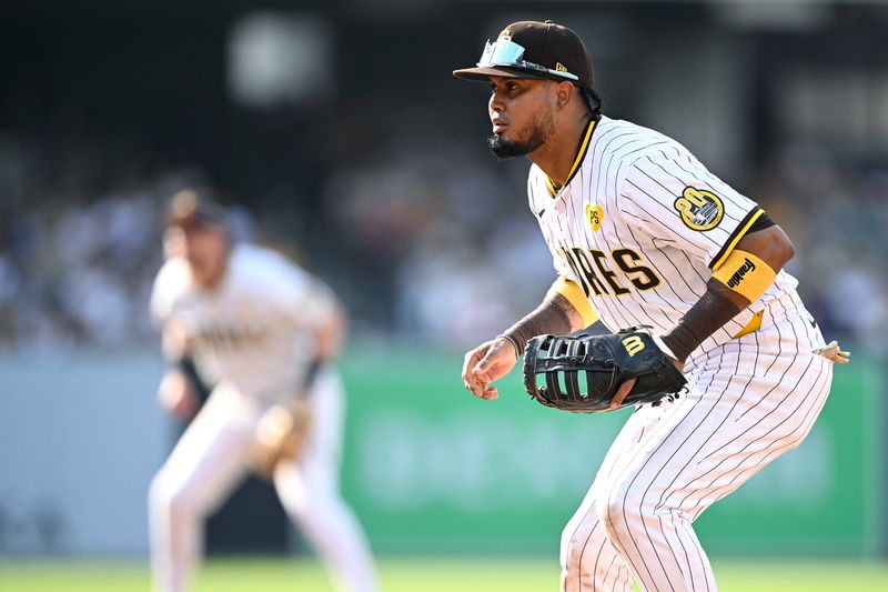 Jul 10, 2024; San Diego, California, USA; San Diego Padres first baseman Luis Arraez (4) looks on during the eighth inning against the Seattle Mariners at Petco Park. Mandatory Credit: Orlando Ramirez-USA TODAY Sports