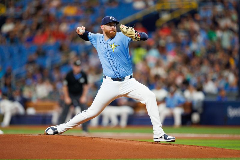 Jun 9, 2024; St. Petersburg, Florida, USA;  Tampa Bay Rays pitcher Zack Littell (52) throws a pitch against the Baltimore Orioles in the first inning at Tropicana Field. Mandatory Credit: Nathan Ray Seebeck-USA TODAY Sports