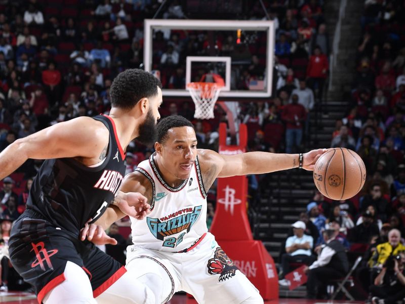 HOUSTON, TX - JANUARY 13:    Desmond Bane #22 of the Memphis Grizzlies dribbles the ball during the game against the Houston Rockets =on January 13, 2025 at the Toyota Center in Houston, Texas. NOTE TO USER: User expressly acknowledges and agrees that, by downloading and or using this photograph, User is consenting to the terms and conditions of the Getty Images License Agreement. Mandatory Copyright Notice: Copyright 2024 NBAE (Photo by Logan Riely/NBAE via Getty Images)