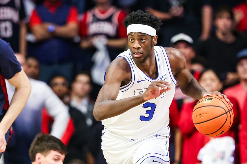 Feb 18, 2026; Tucson, Arizona, USA; Brigham Young Cougars forward AJ Dybantsa (3) dribbles the ball during the first half of the game against the Arizona Wildcats at McKale Memorial Center. Mandatory Credit: Aryanna Frank-Imagn Images