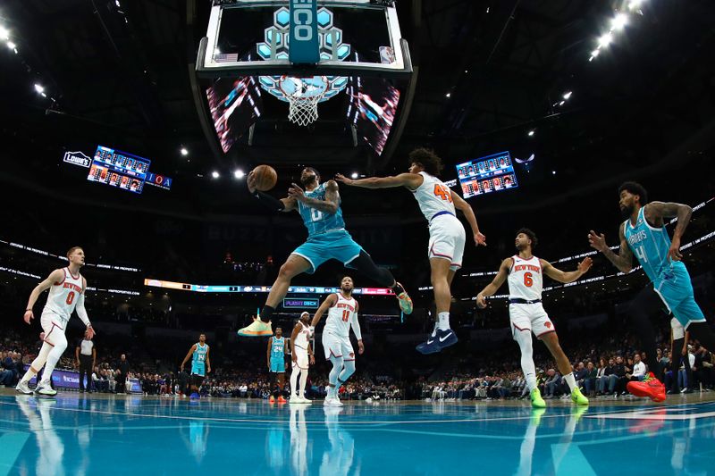 CHARLOTTE, NORTH CAROLINA - JANUARY 29: Miles Bridges #0 of the Charlotte Hornets attempts a lay up during the first half of the game against the New York Knicks at Spectrum Center on January 29, 2024 in Charlotte, North Carolina. NOTE TO USER: User expressly acknowledges and agrees that, by downloading and or using this photograph, User is consenting to the terms and conditions of the Getty Images License Agreement. (Photo by Jared C. Tilton/Getty Images)