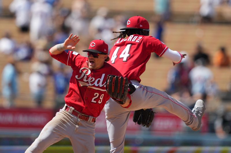 Jul 30, 2023; Los Angeles, California, USA; Cincinnati Reds third baseman Elly De La Cruz (44) celebrates with center fielder TJ Friedl (29) after the game against the Los Angeles Dodgers at Dodger Stadium. Mandatory Credit: Kirby Lee-USA TODAY Sports