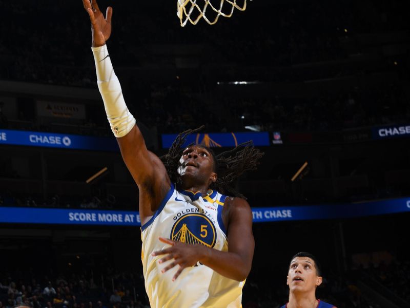 SAN FRANCISCO, CA - OCTOBER 13: Kevon Looney #5 of the Golden State Warriors drives to the basket during the game against the Detroit Pistons during a NBA Preseason game on October 13, 2024 at Chase Center in San Francisco, California. NOTE TO USER: User expressly acknowledges and agrees that, by downloading and or using this photograph, user is consenting to the terms and conditions of Getty Images License Agreement. Mandatory Copyright Notice: Copyright 2024 NBAE (Photo by Noah Graham/NBAE via Getty Images)