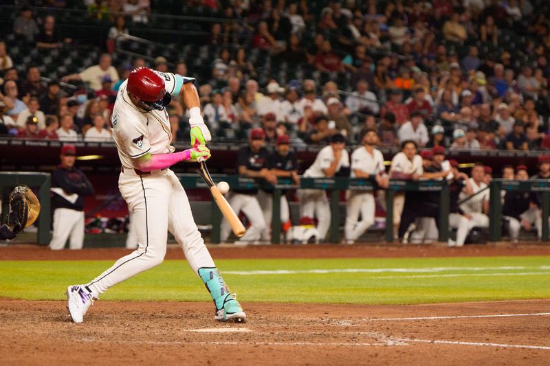 Aug 5, 2025; Phoenix, Arizona, USA; Arizona Diamondbacks outfielder Lourdes Gurriel Jr. (12) cracks his bat tenth inning against the San Diego Padres at Chase Field. Mandatory Credit: Allan Henry-Imagn Images