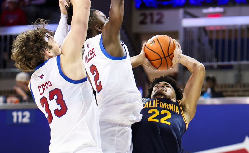 Jan 29, 2025; Dallas, Texas, USA;  California Golden Bears guard Christian Tucker (22) shoots as Southern Methodist Mustangs forward Matt Cross (33) and Southern Methodist Mustangs guard Boopie Miller (2) defend during the second half at Moody Coliseum. Mandatory Credit: Kevin Jairaj-Imagn Images