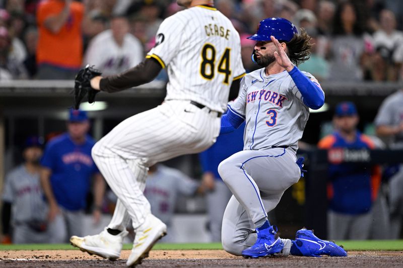 Aug 22, 2024; San Diego, California, USA; New York Mets designated hitter Jesse Winker (3) scores a run on a passed ball ahead of San Diego Padres starting pitcher Dylan Cease (84) during the fourth inning at Petco Park. Mandatory Credit: Orlando Ramirez-USA TODAY Sports