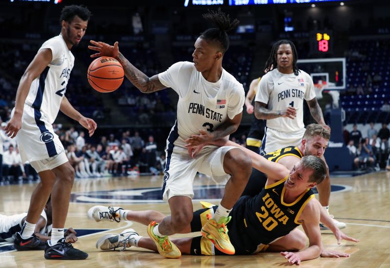 Feb 8, 2024; University Park, Pennsylvania, USA; Penn State Nittany Lions guard Nick Kern Jr (3) reaches for the loose ball during the second half against the Iowa Hawkeyes at Bryce Jordan Center. Penn State defeated Iowa 89-79. Mandatory Credit: Matthew O'Haren-USA TODAY Sports