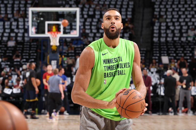 DENVER, CO - MAY 19: Rudy Gobert #27 of the Minnesota Timberwolves warms up before the game against the Denver Nuggets during Round 2 Game 7 of the 2024 NBA Playoffs on May 19, 2023 at the Ball Arena in Denver, Colorado. NOTE TO USER: User expressly acknowledges and agrees that, by downloading and/or using this Photograph, user is consenting to the terms and conditions of the Getty Images License Agreement. Mandatory Copyright Notice: Copyright 2023 NBAE (Photo by David Sherman/NBAE via Getty Images)