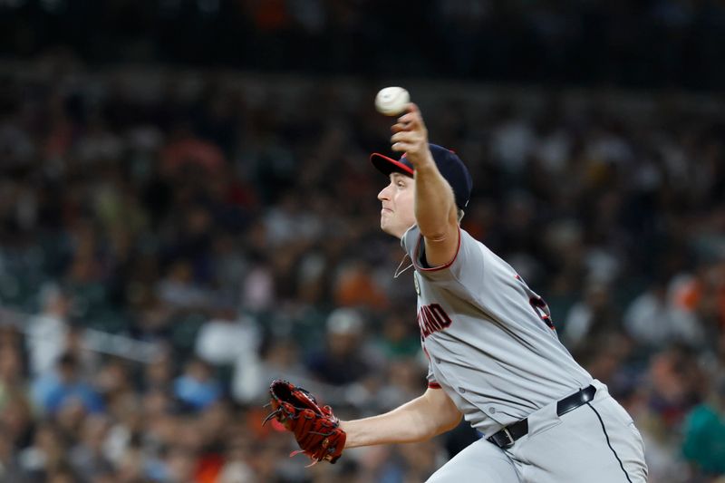 Sep 16, 2025; Detroit, Michigan, USA; Cleveland Guardians pitcher Tim Herrin (29) pitches in the eighth inning against the Detroit Tigers at Comerica Park. Mandatory Credit: Rick Osentoski-Imagn Images