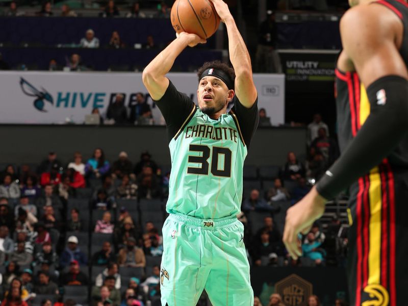 CHARLOTTE, NC - NOVEMBER 30: Seth Curry #30 of the Charlotte Hornets shoots the ball during the game against the Atlanta Hawks on November 30, 2024 at Spectrum Center in Charlotte, North Carolina. NOTE TO USER: User expressly acknowledges and agrees that, by downloading and or using this photograph, User is consenting to the terms and conditions of the Getty Images License Agreement. Mandatory Copyright Notice: Copyright 2024 NBAE (Photo by Kent Smith/NBAE via Getty Images)