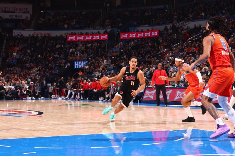 OKLAHOMA CITY, OK - JANUARY 23: Malcolm Brogdon #11 of the Portland Trail Blazers drives to the basket during the game against the Oklahoma City Thunder on January 23, 2024 at Paycom Arena in Oklahoma City, Oklahoma. NOTE TO USER: User expressly acknowledges and agrees that, by downloading and or using this photograph, User is consenting to the terms and conditions of the Getty Images License Agreement. Mandatory Copyright Notice: Copyright 2024 NBAE (Photo by Zach Beeker/NBAE via Getty Images)