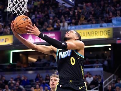 INDIANAPOLIS, INDIANA - DECEMBER 23: Tyrese Haliburton #0 of the Indiana Pacers takes a shot in the game against the Orlando Magic xd2 at Gainbridge Fieldhouse on December 23, 2023 in Indianapolis, Indiana. NOTE TO USER: User expressly acknowledges and agrees that, by downloading and or using this photograph, User is consenting to the terms and conditions of the Getty Images License Agreement. (Photo by Justin Casterline/Getty Images)