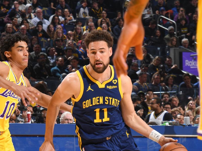 SAN FRANCISCO, CA - FEBRUARY 22:  Klay Thompson #11 of the Golden State Warriors goes to the basket during the game on February 22, 2024 at Chase Center in San Francisco, California. NOTE TO USER: User expressly acknowledges and agrees that, by downloading and or using this photograph, user is consenting to the terms and conditions of Getty Images License Agreement. Mandatory Copyright Notice: Copyright 2024 NBAE (Photo by Noah Graham/NBAE via Getty Images)