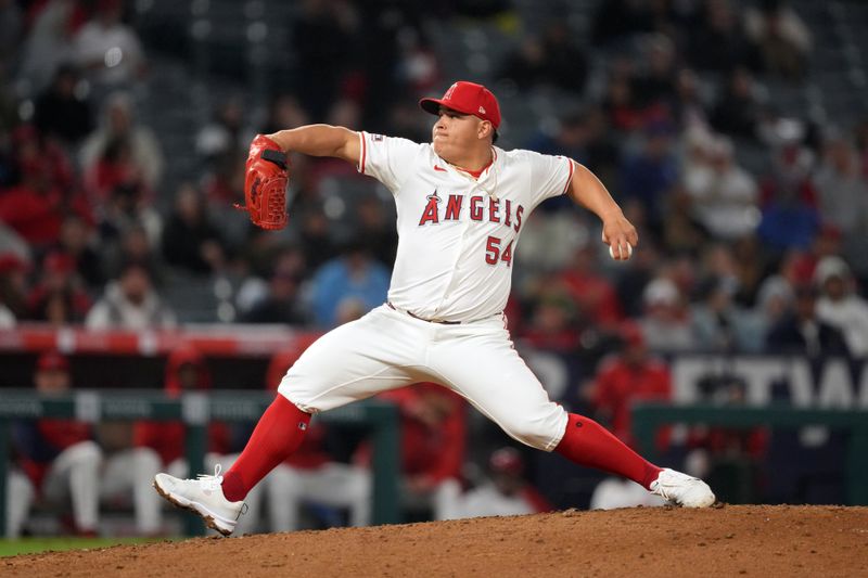 Apr 22, 2024; Anaheim, California, USA; Los Angeles Angels pitcher Jose Suarez (54) throws in the ninth inning against the Baltimore Orioles at Angel Stadium. Mandatory Credit: Kirby Lee-USA TODAY Sports