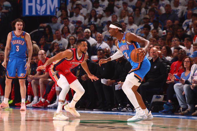 OKLAHOMA CITY, OK - APRIL 24: Shai Gilgeous-Alexander #2 of the Oklahoma City Thunder dribbles the ball during the game against the New Orleans Pelicans during Round 1 Game 2 of the 2024 NBA Playoffs on April 24, 2024 at Paycom Arena in Oklahoma City, Oklahoma. NOTE TO USER: User expressly acknowledges and agrees that, by downloading and or using this photograph, User is consenting to the terms and conditions of the Getty Images License Agreement. Mandatory Copyright Notice: Copyright 2024 NBAE (Photo by Zach Beeker/NBAE via Getty Images)