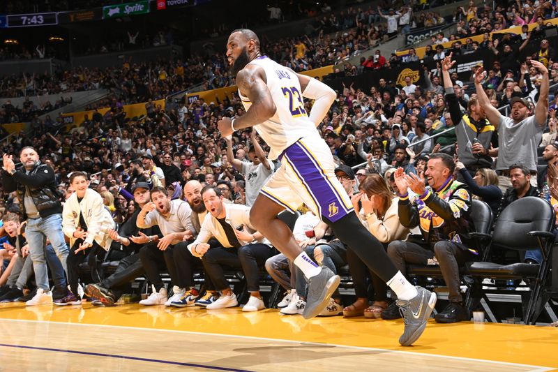 LOS ANGELES, CA - MARCH 16:  LeBron James #23 of the Los Angeles Lakers looks on during the game on March 16, 2024 at Crypto.Com Arena in Los Angeles, California. NOTE TO USER: User expressly acknowledges and agrees that, by downloading and/or using this Photograph, user is consenting to the terms and conditions of the Getty Images License Agreement. Mandatory Copyright Notice: Copyright 2024 NBAE (Photo by Andrew D. Bernstein/NBAE via Getty Images)